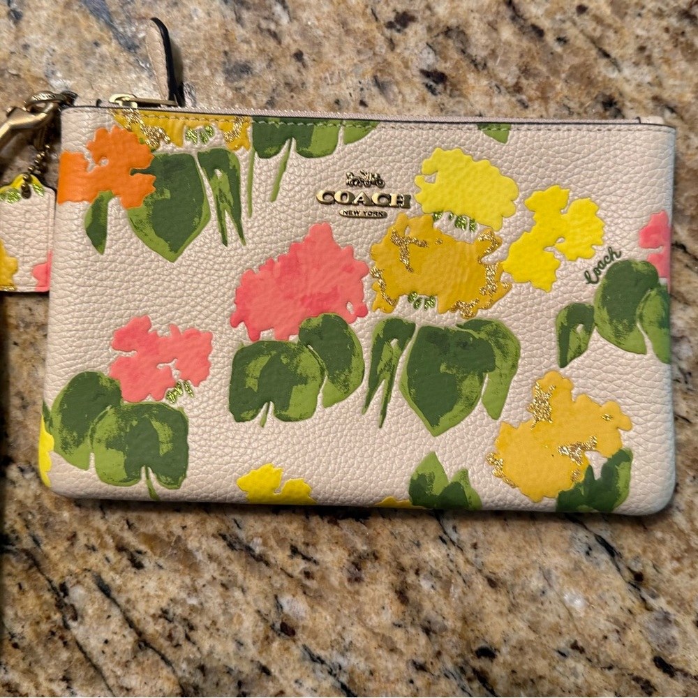 Coach Floral Wristlet/Clutch with gorgeous cream, green, yellow, pink and orange